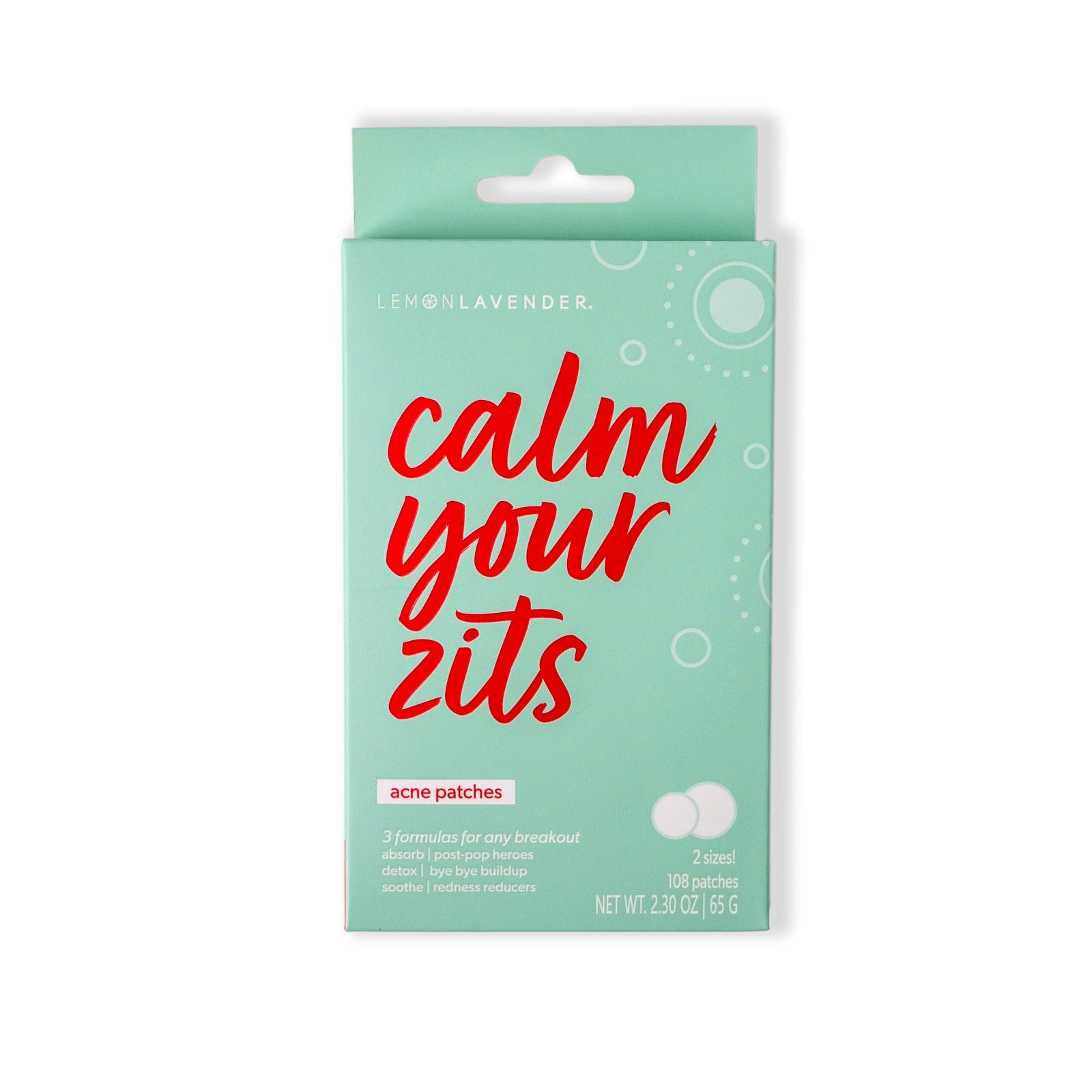 Pack of acne patches with 'calm your zits' text on a light green background